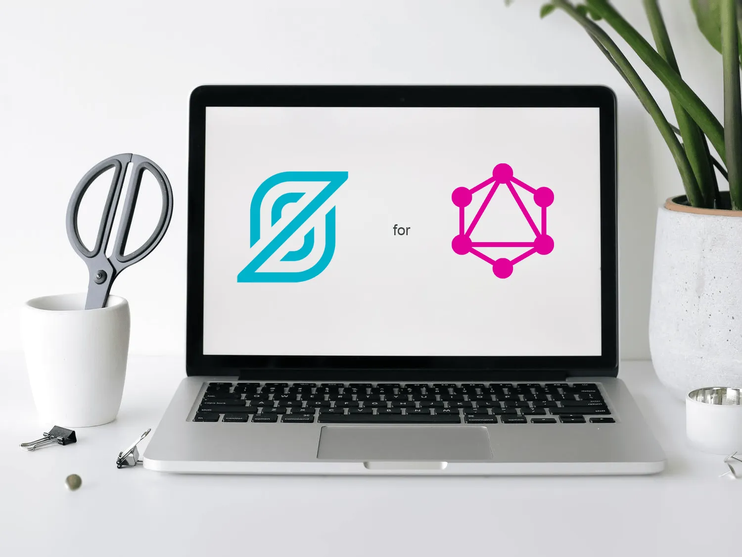 Image of laptop with StepZen and GraphQL logo
